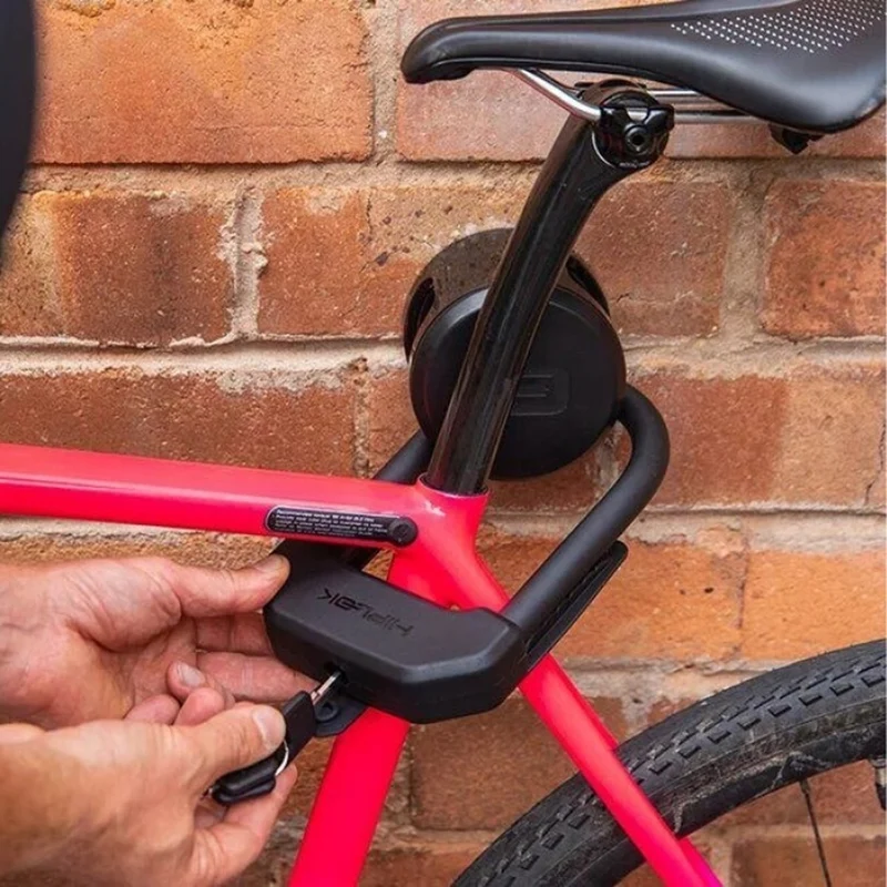 Ancre noire pour vélo avec fixation au sol et au mur Ankr Hiplok