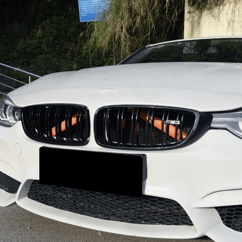 Garnitures V-Brace calandre BMW barres colorées
